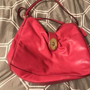 Used pink leather coach purse.